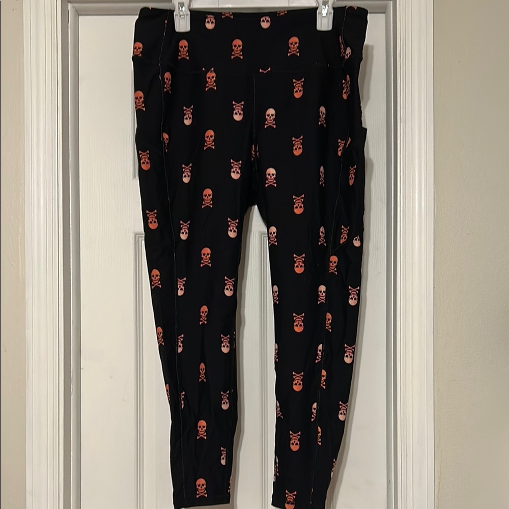 Torrid Black and Pink Skull Leggings with pockets size 2